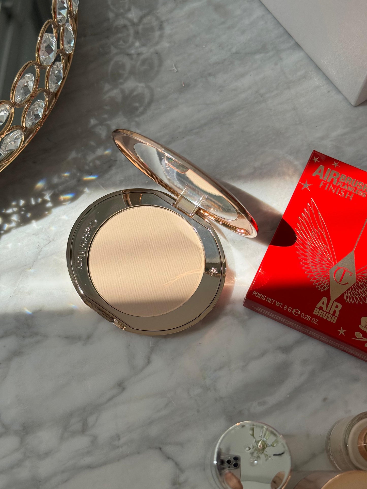 CHARLOTTE TILBURY Airbrush Flawless Finish (1)
Complexion Perfecting Micro Powder