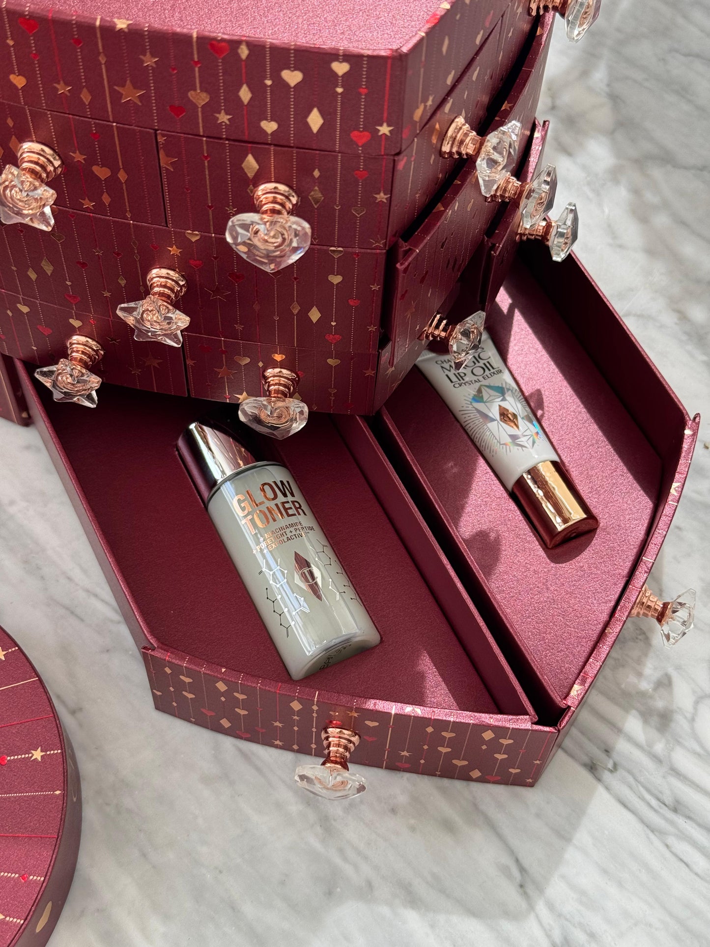 CHARLOTTE TILBURY’S Beauty Treasure Chest Of Love Set
12 Door Beauty Advent Calendar