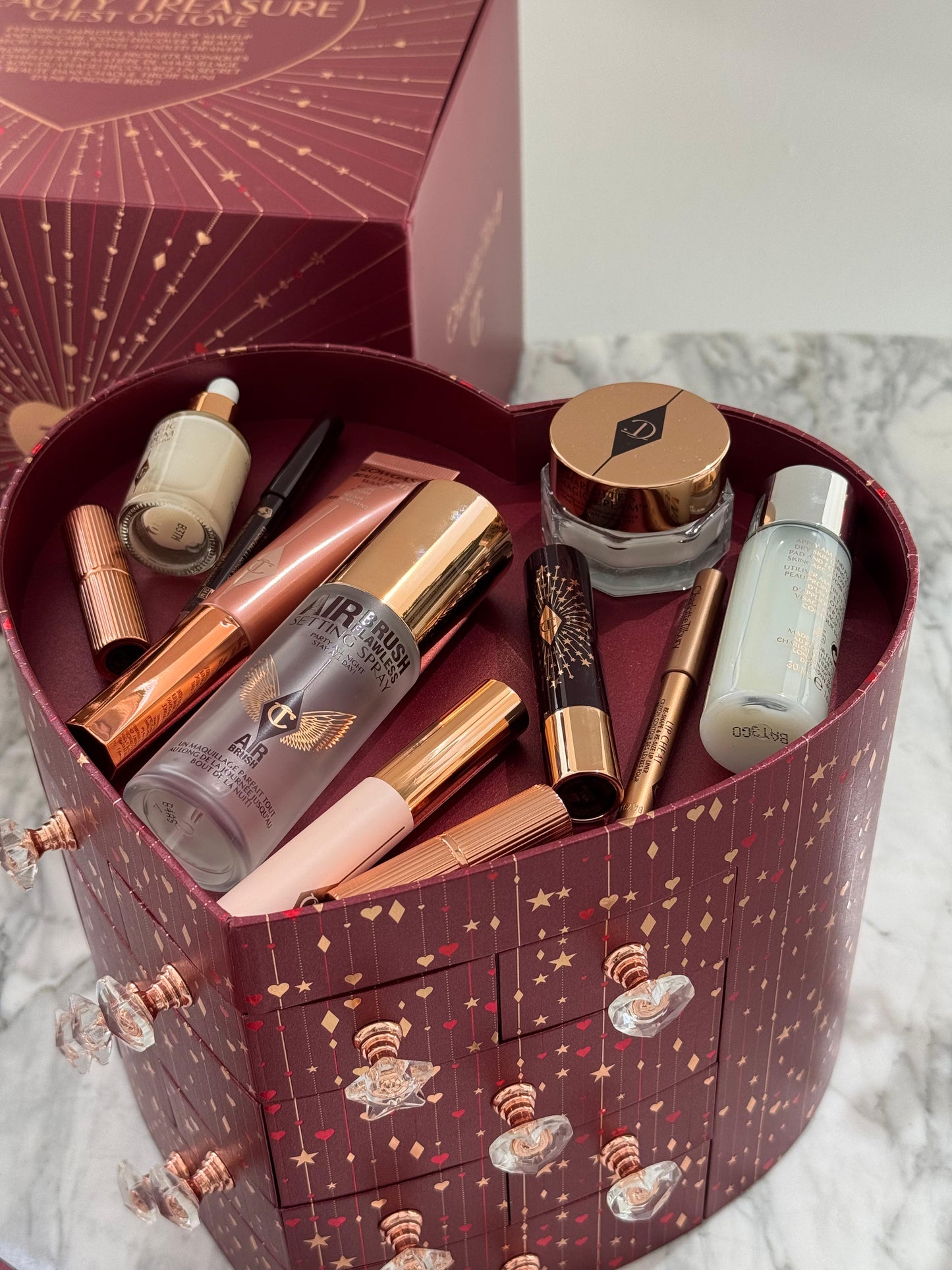 CHARLOTTE TILBURY’S Beauty Treasure Chest Of Love Set
12 Door Beauty Advent Calendar