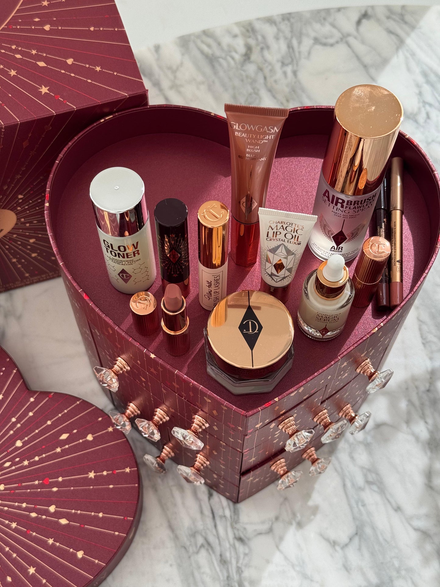 CHARLOTTE TILBURY’S Beauty Treasure Chest Of Love Set
12 Door Beauty Advent Calendar
