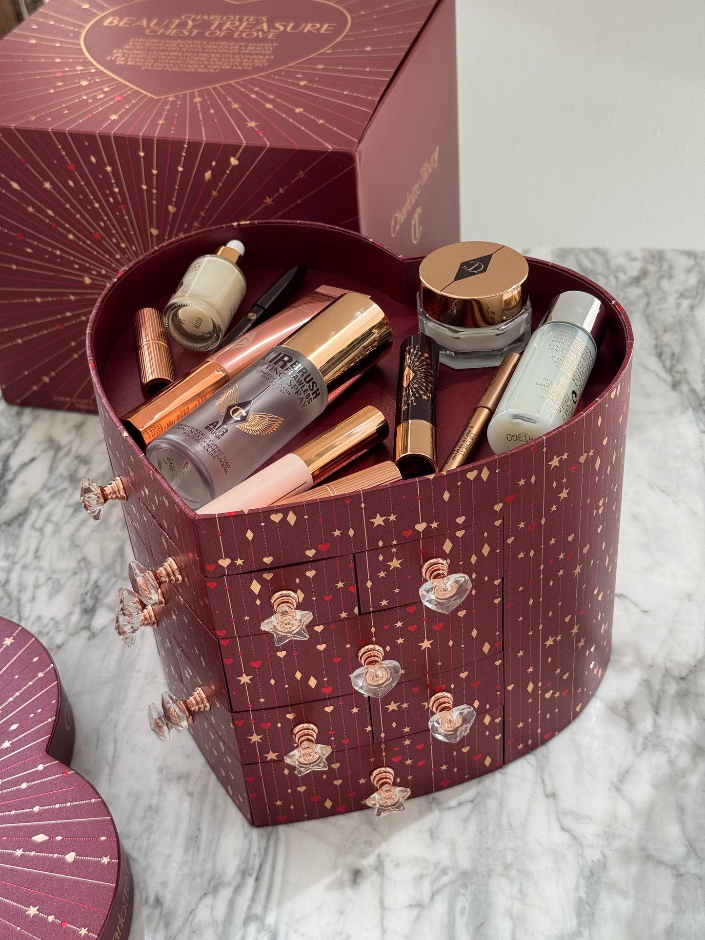 CHARLOTTE TILBURY’S Beauty Treasure Chest Of Love Set
12 Door Beauty Advent Calendar