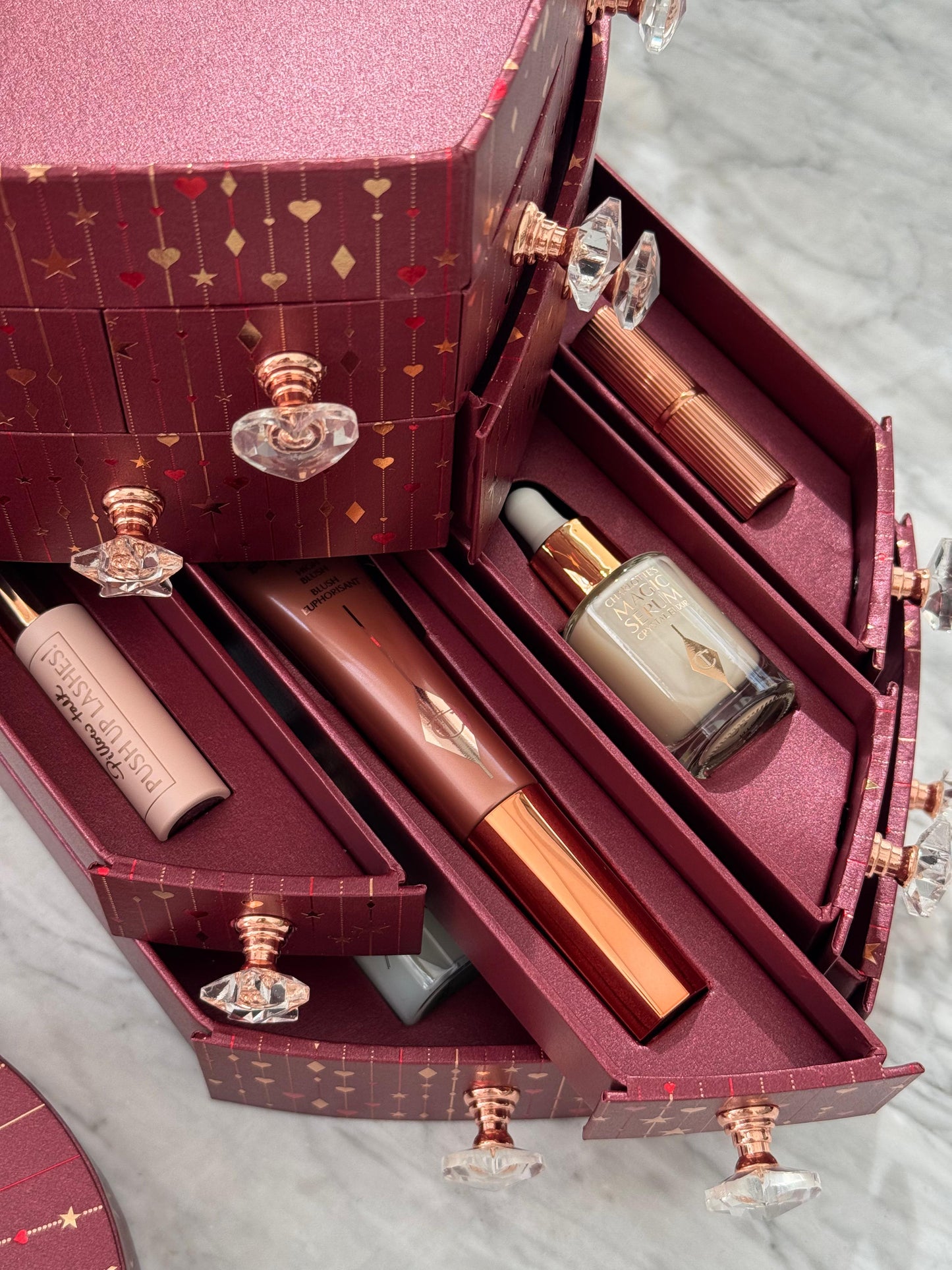 CHARLOTTE TILBURY’S Beauty Treasure Chest Of Love Set
12 Door Beauty Advent Calendar