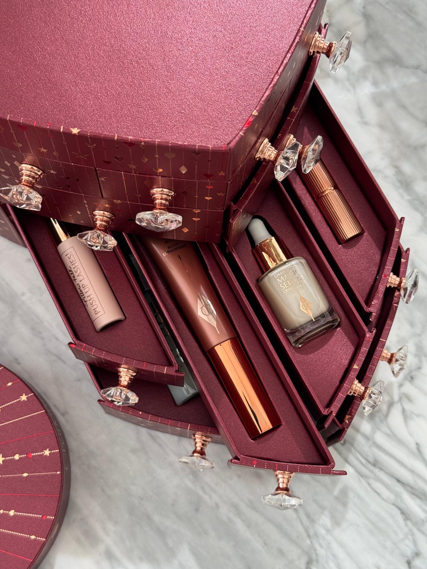CHARLOTTE TILBURY’S Beauty Treasure Chest Of Love Set
12 Door Beauty Advent Calendar