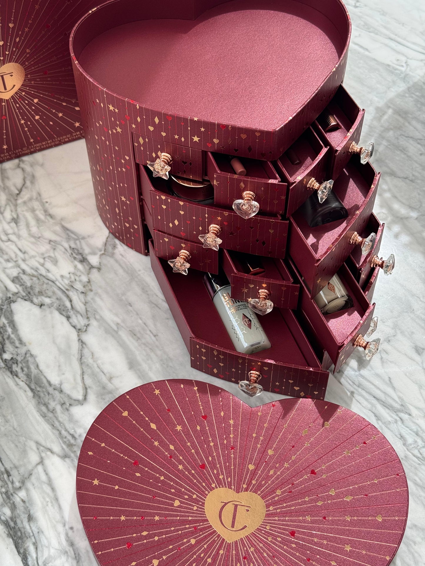 CHARLOTTE TILBURY’S Beauty Treasure Chest Of Love Set
12 Door Beauty Advent Calendar