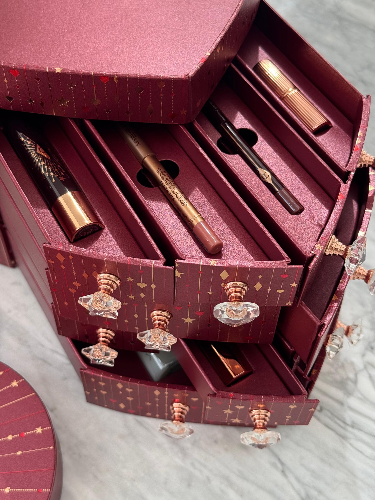 CHARLOTTE TILBURY’S Beauty Treasure Chest Of Love Set
12 Door Beauty Advent Calendar