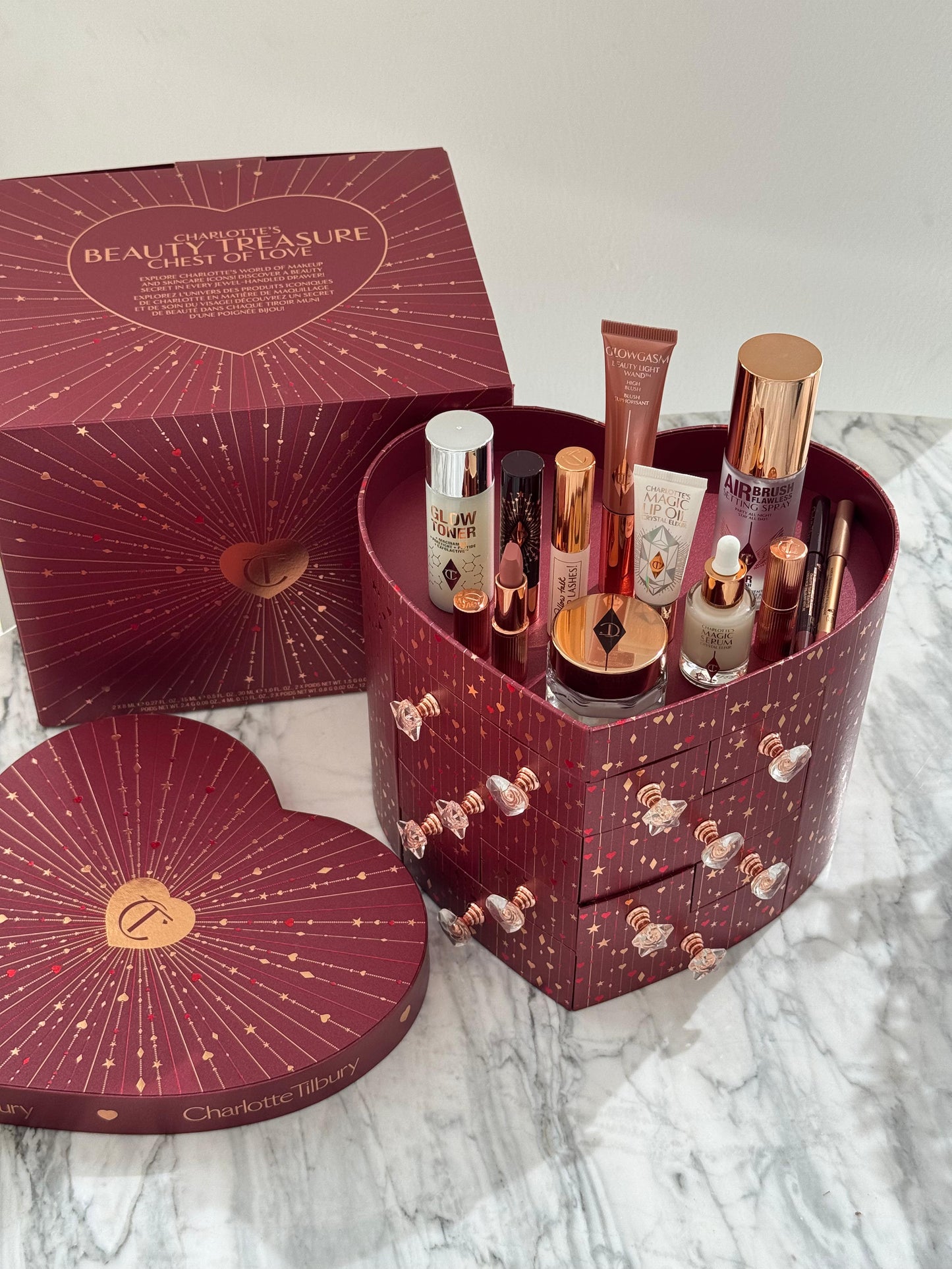 CHARLOTTE TILBURY’S Beauty Treasure Chest Of Love Set
12 Door Beauty Advent Calendar