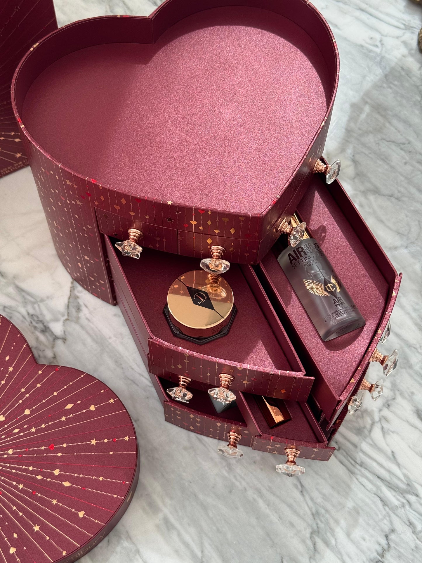 CHARLOTTE TILBURY’S Beauty Treasure Chest Of Love Set
12 Door Beauty Advent Calendar