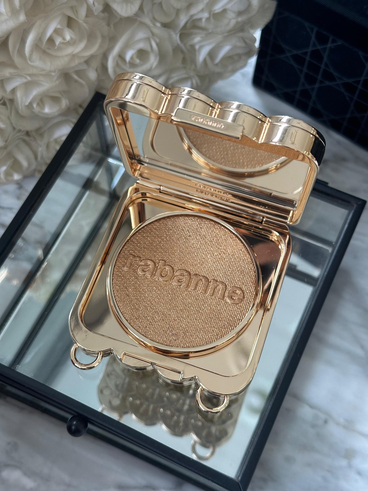 PACO RABANNE 1969 Makeup Clutch
Ultra-Shiny, All-Over Luminizer, Second Skin Comfort