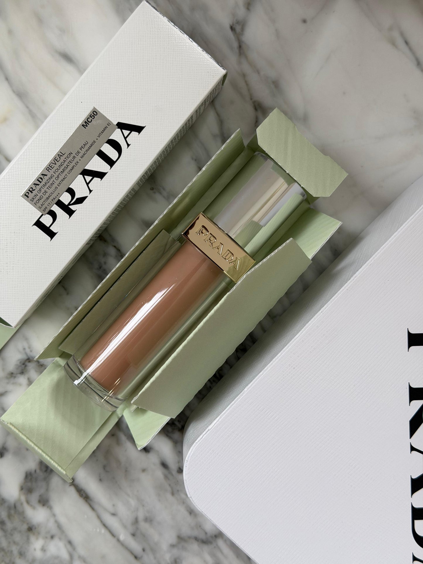 PRADA Reveal Skin Optimizing Foundation (MC50)
Medium Coverage, Soft Matte, SPF17