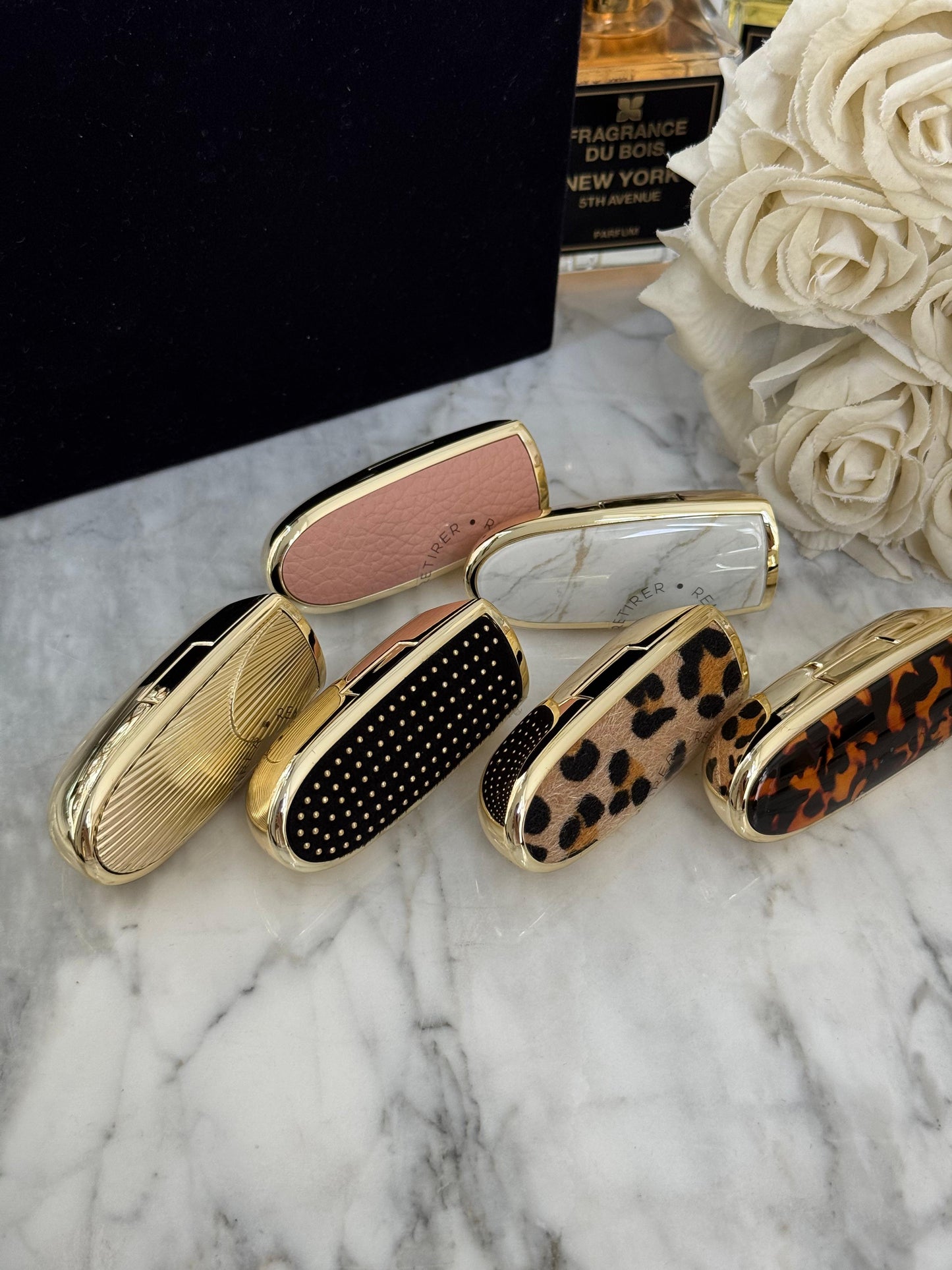 GUERLAIN Rouge G L'Écaille
- The Double Mirror Jewel Case