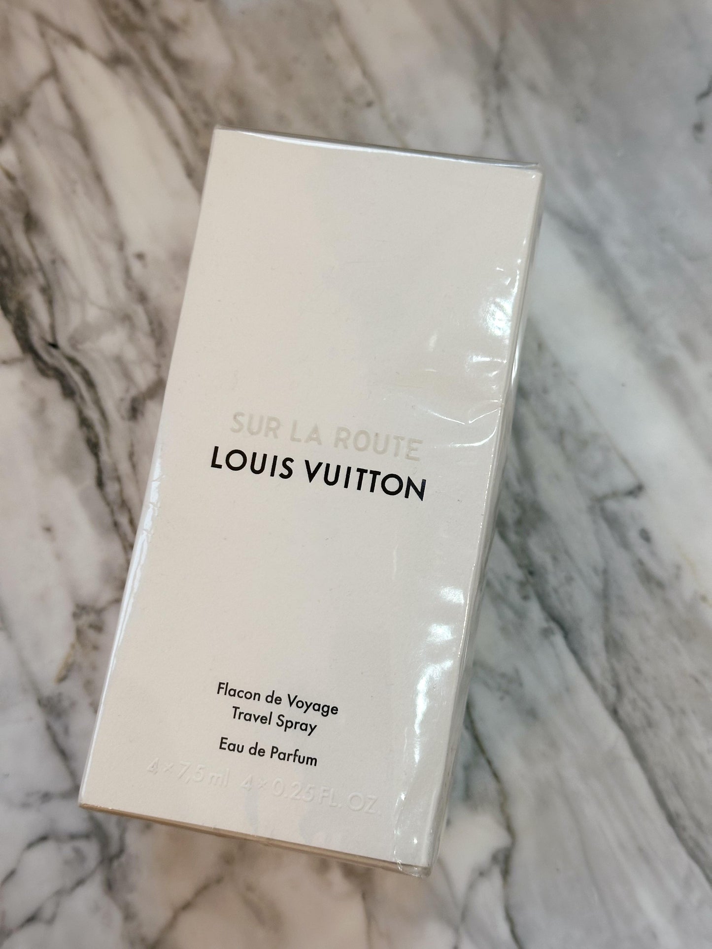 LOUIS VUITTON Sur La Route
Eau De Parfum Travel Spray 4x7.5ml