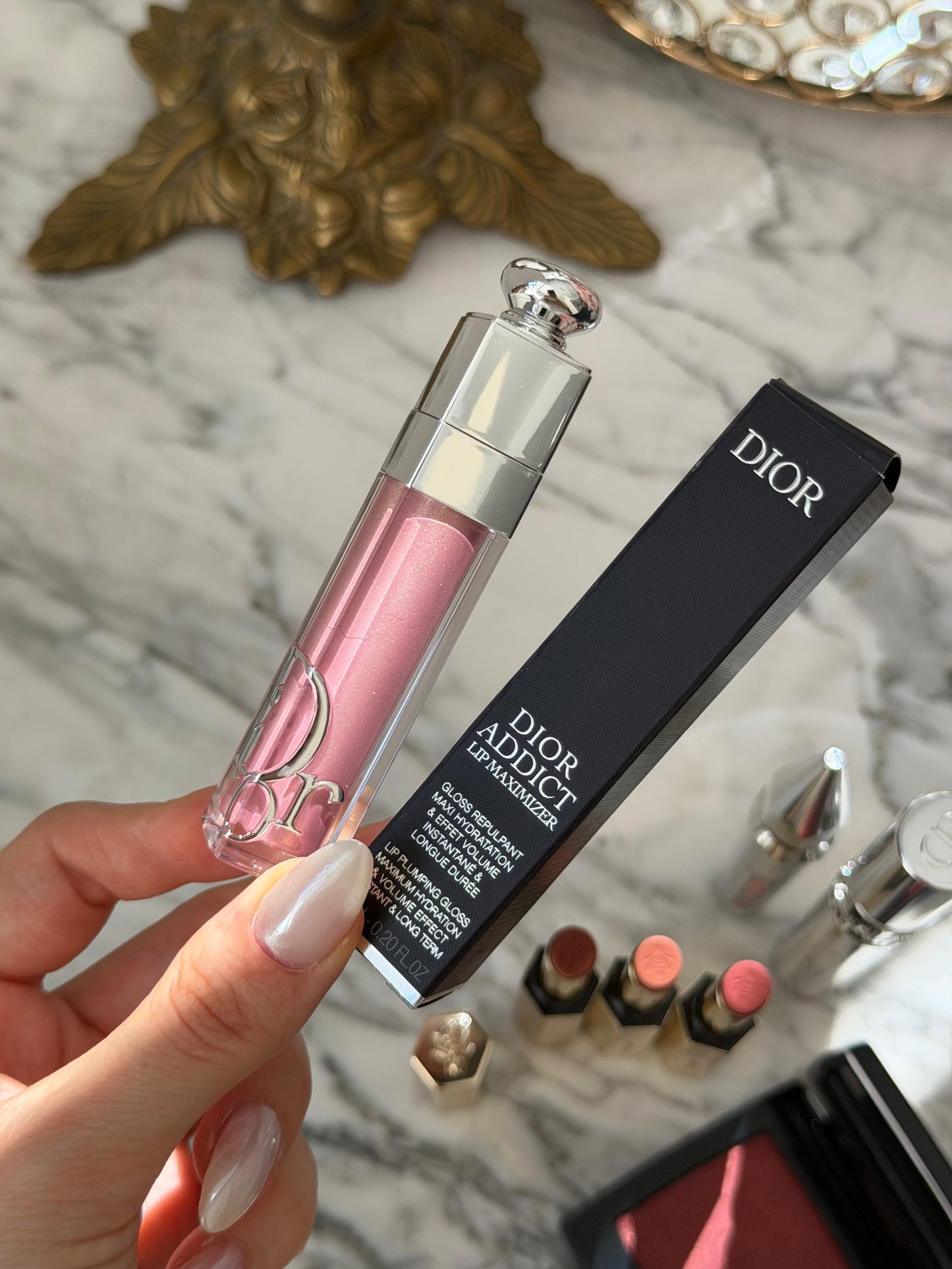 DIOR Addict Lip Maximizer (053)
Plumping Gloss - Instant and Long-Term Volume Effect - 24h Hydration