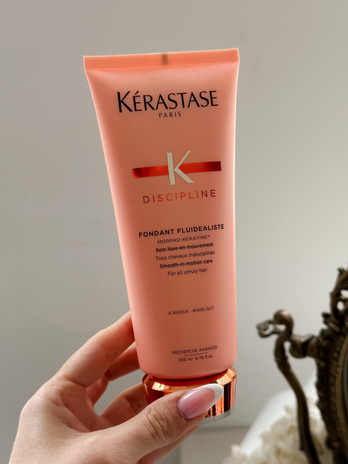 KÉRASTASE Discipline Fluidealiste
Smoothing Conditioner for Frizzy Hair